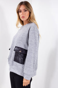 MAGLIA TASCHE TRAPUNTATE