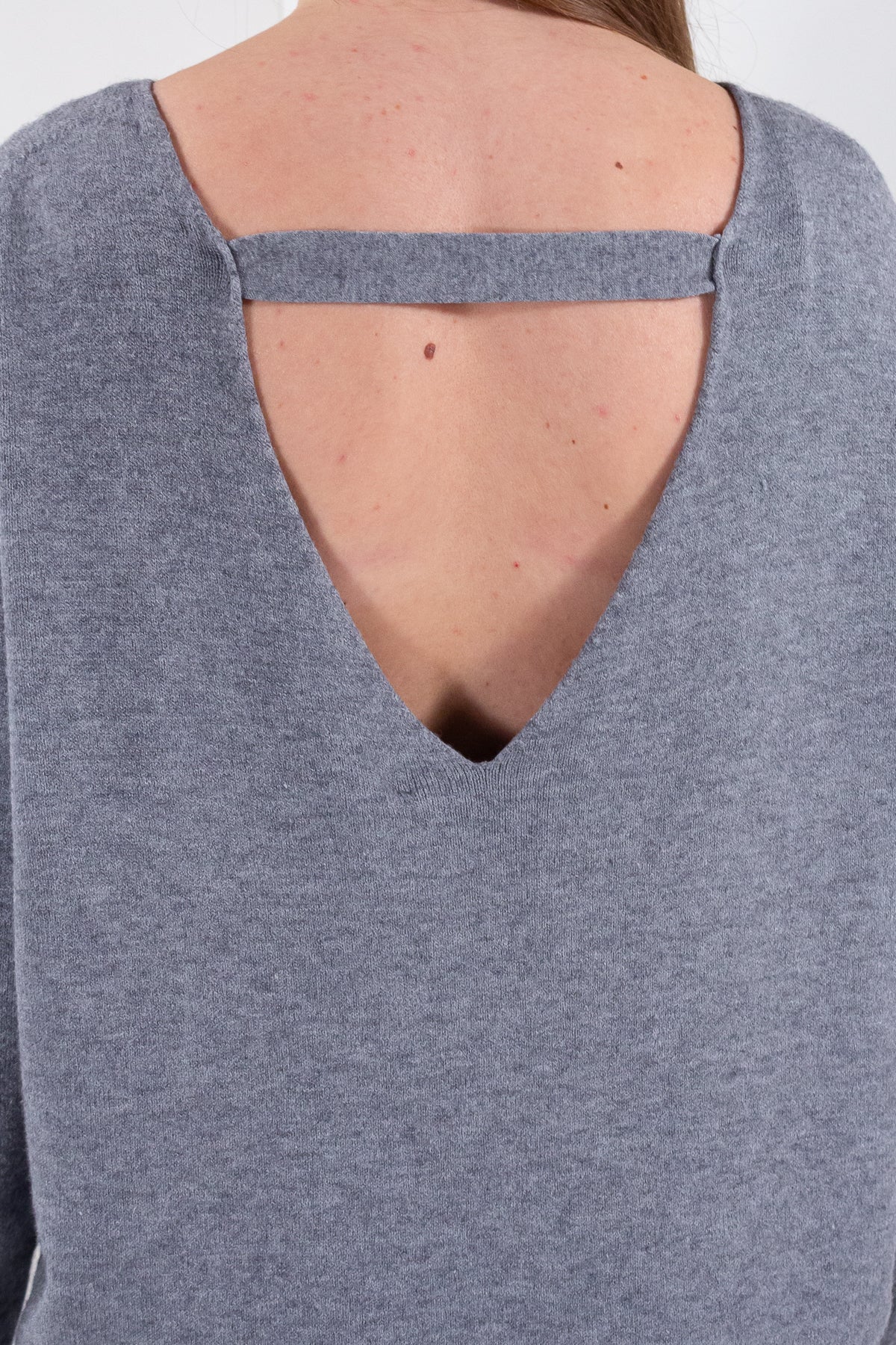 ABITO SCOLLO SCHIENA**