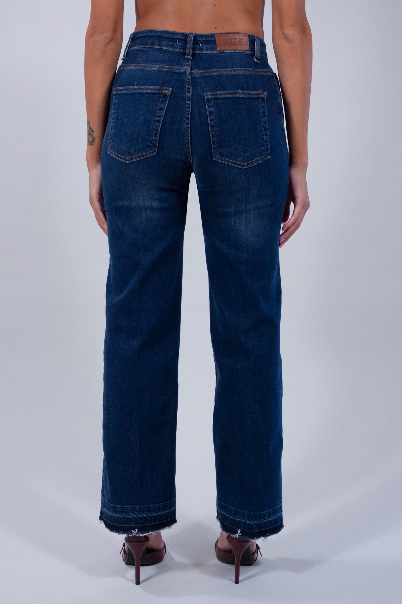 JEANS FLARE SFRANGIATO